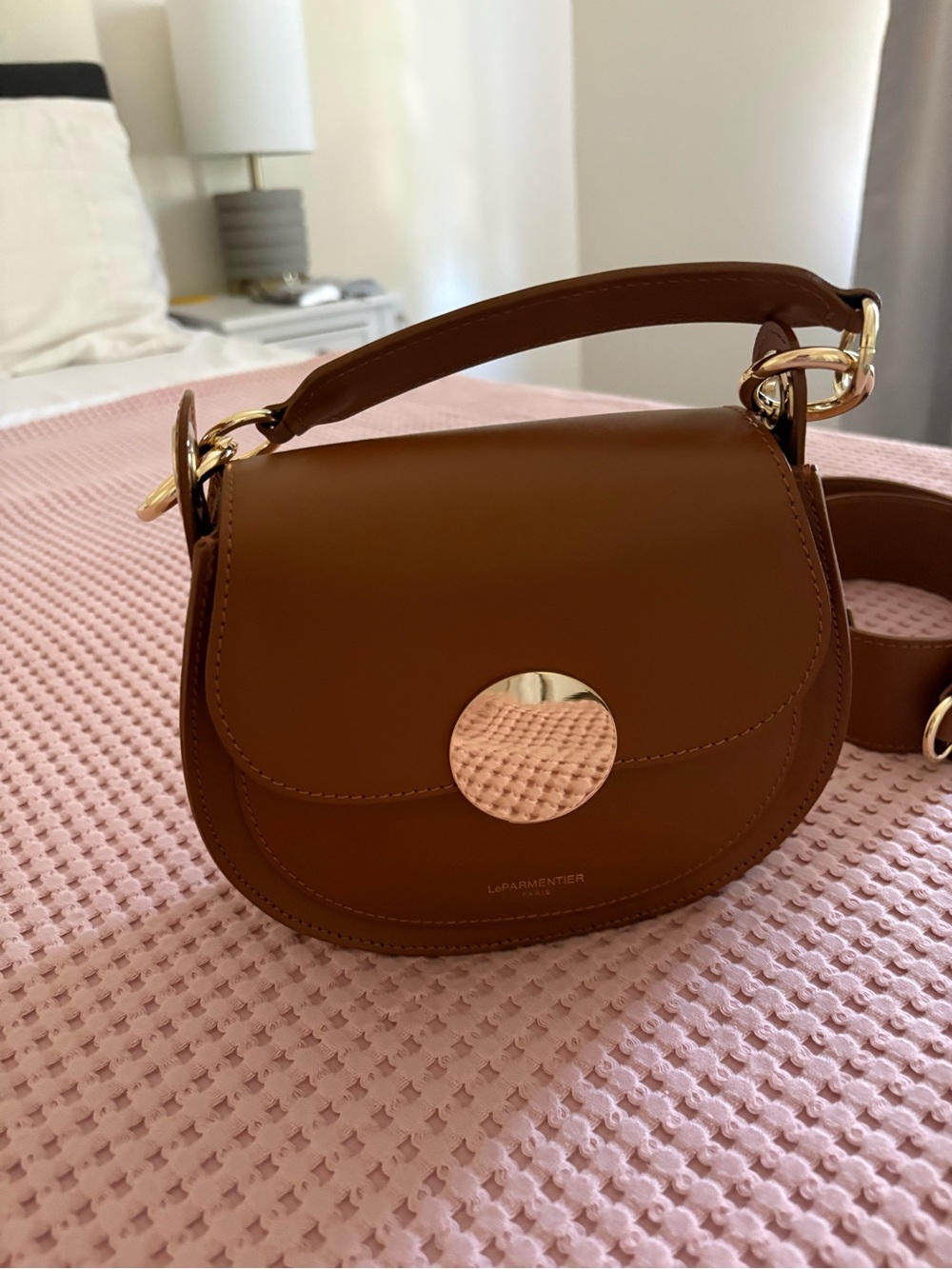 Yucca Cognac Curved Saddle Crossbody with Gold Accent by LeParmentier Paris